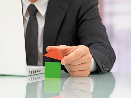 Businessman in an office with a laptop