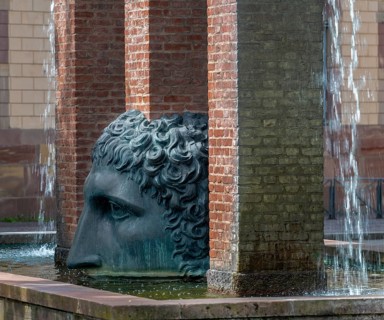 Fountain with double-faced Janus head