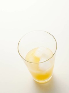 Glass of Pernod with ice cubes