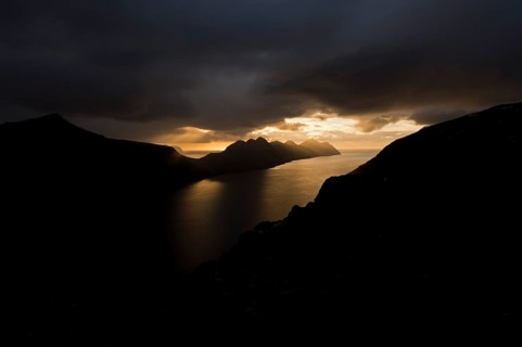 Dramatic mood lighting over the islands of Kalsoy and Kunoy