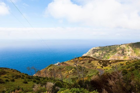 Cable car station on the cliff coast of Santa Maria Madalena at the foot of Cabo Girao mountain