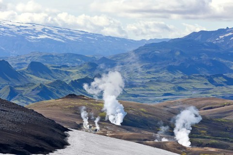 View from the Mt Hrafntinnusker or 'Raven Mountain' across hot springs to Myrdalsjokull galcier