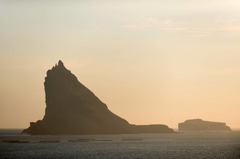 Steep towering rocks off Vagar