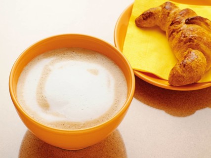 Latte with a croissant