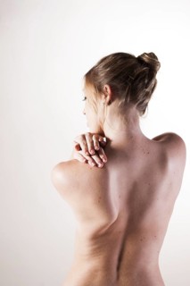 Bare back of a young woman