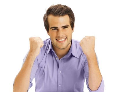 Businessman clenching fists