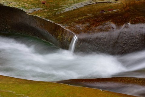 Water flows over rocks
