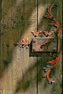 Old doorlock on a door of the Muehlfeldkirche church