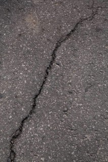 Cracked asphalt pavement