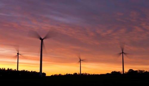 Wind turbines at sunset