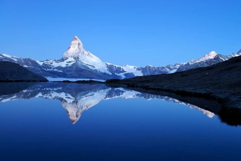 Mt Matterhorn reflected in Stellisee Lake at dusk