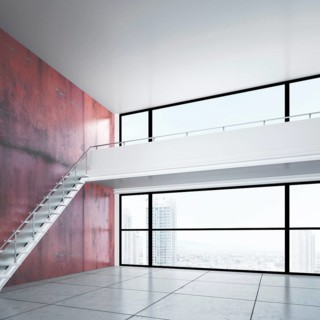 Empty room with a gallery level