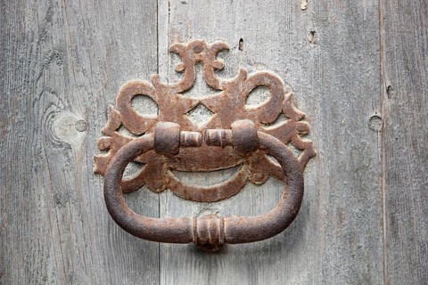 Knocker on an old wooden door
