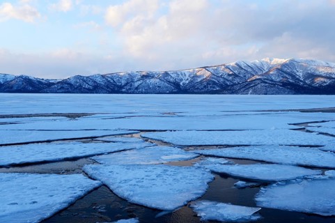 Frozen Lake Kussharo with ice floes in the front