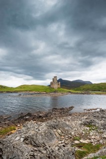Ruins of Ardvreck Castle on a peninsula in the lake of Loch Assynt