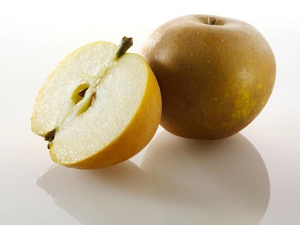 One whole and one cut Russet apple