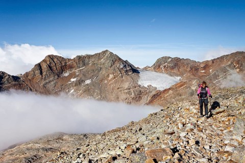 Mountain climber during the ascent of Fernerkoepfl Mountain in the Rieserferner Group in the Puster Valley