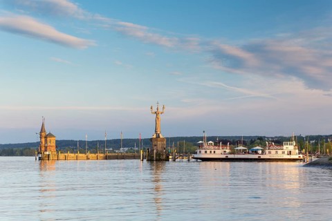 Harbour entrance of Konstanz with the statue of Imperia and the historic ferry 'Konstanz'