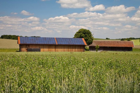 Barn with a solar-panelled roof