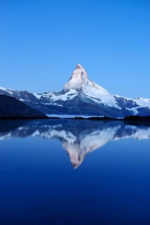 Mt Matterhorn reflected in Stellisee Lake at dusk