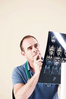 Doctor looking at an X-ray