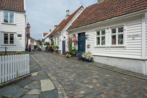 White wooden houses with floral decorations