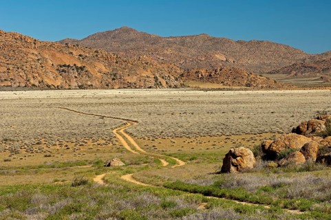 Trail for off-road vehicles through a steppe landscape