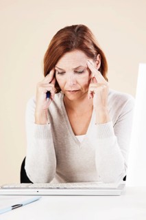 Woman sitting at her computer
