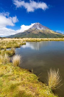 Mountain lake with the Mount Taranaki volcano