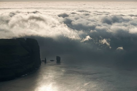 Kollur Mountain and the sea stacks of Risin and Kellingin in the evening light