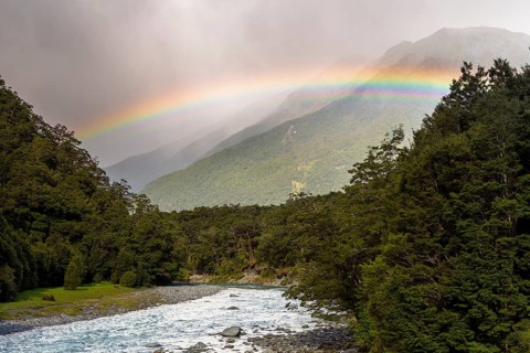 Makarora River with a rainbow
