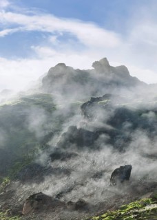 Steam rising from a lava field at the foot of Brennisteinsalda Volcano