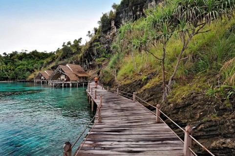 Wooden pier and water bungalows in a holiday resort