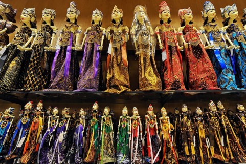 Wooden dolls in the souvenir shop at Soekarno-Hatta Airport
