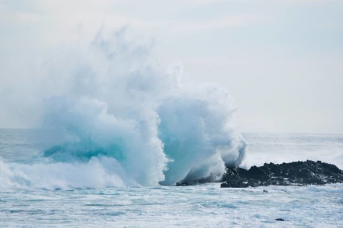 Waves breaking on the shore