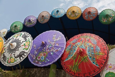 Brightly painted Asian sun umbrellas made of paper
