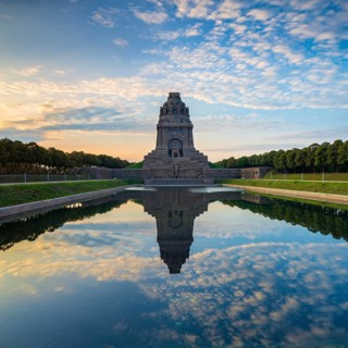 Monument to the Battle of the Nations in Morning Mood with water reflection