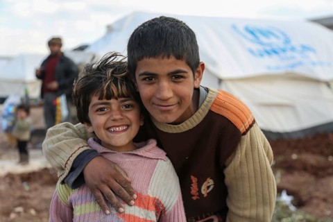 Children in a camp for Syrian refugees of the civil war near the Turkish border