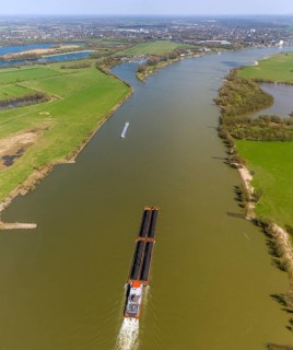 Push boat transporting coal on the Rhine River