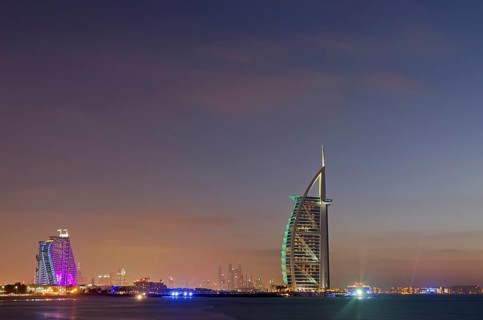 The luxury hotel Burj Al Arab off Jumeirah beach at dusk