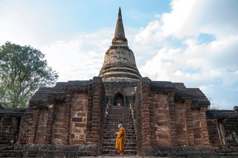 Praying Buddhist monk