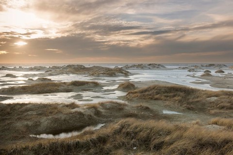 Strong westerly winds driving water from the North Sea into the dunes