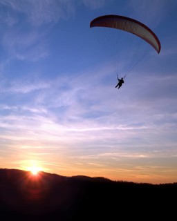 Paraglider at sunset