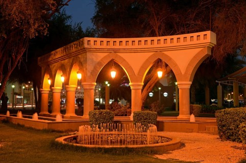 Archs in a park at dusk