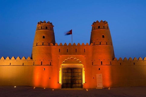 The gate of Al Jahili Fort at dawn