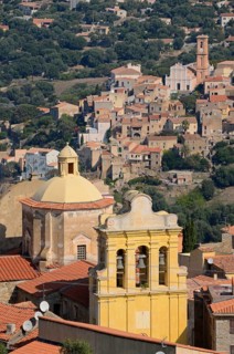 The colorful facades of Cateri with its roofs