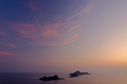 Les Iles Sanguinaires in the mediterranean sea at the blue hour after sunset seen from Tour de la Parata. Les Iles Sanguinaires are in the department Corse-du-Sud