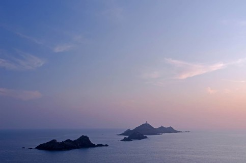 Les Iles Sanguinaires in the mediterranean sea at the blue hour after sunset seen from Tour de la Parata. Les Iles Sanguinaires are in the department Corse-du-Sud
