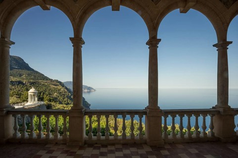 View through arched windows of the park and the coastline