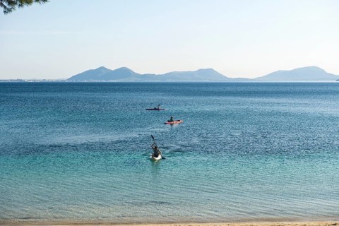 Bay and kayakers
